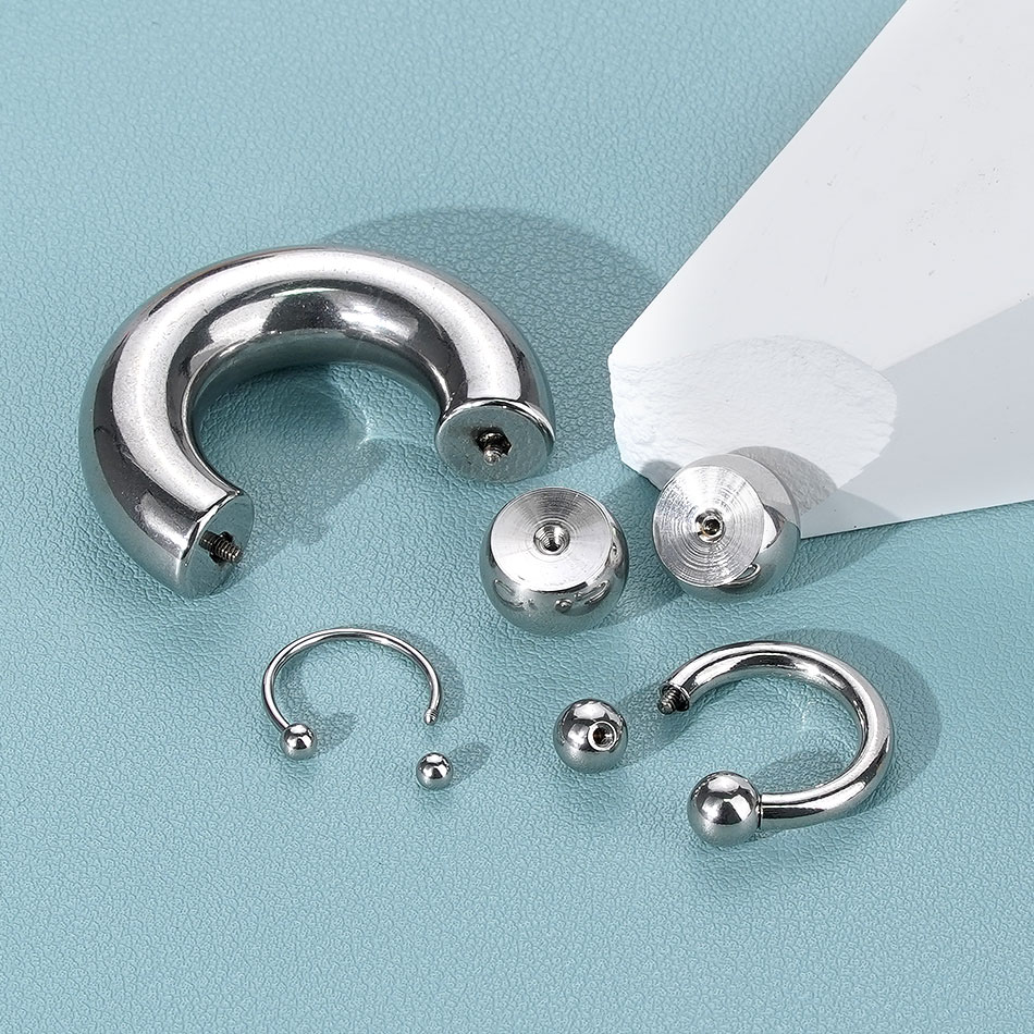 Anneau en fer à cheval en acie - Body Jewelry Gauges avis et prix